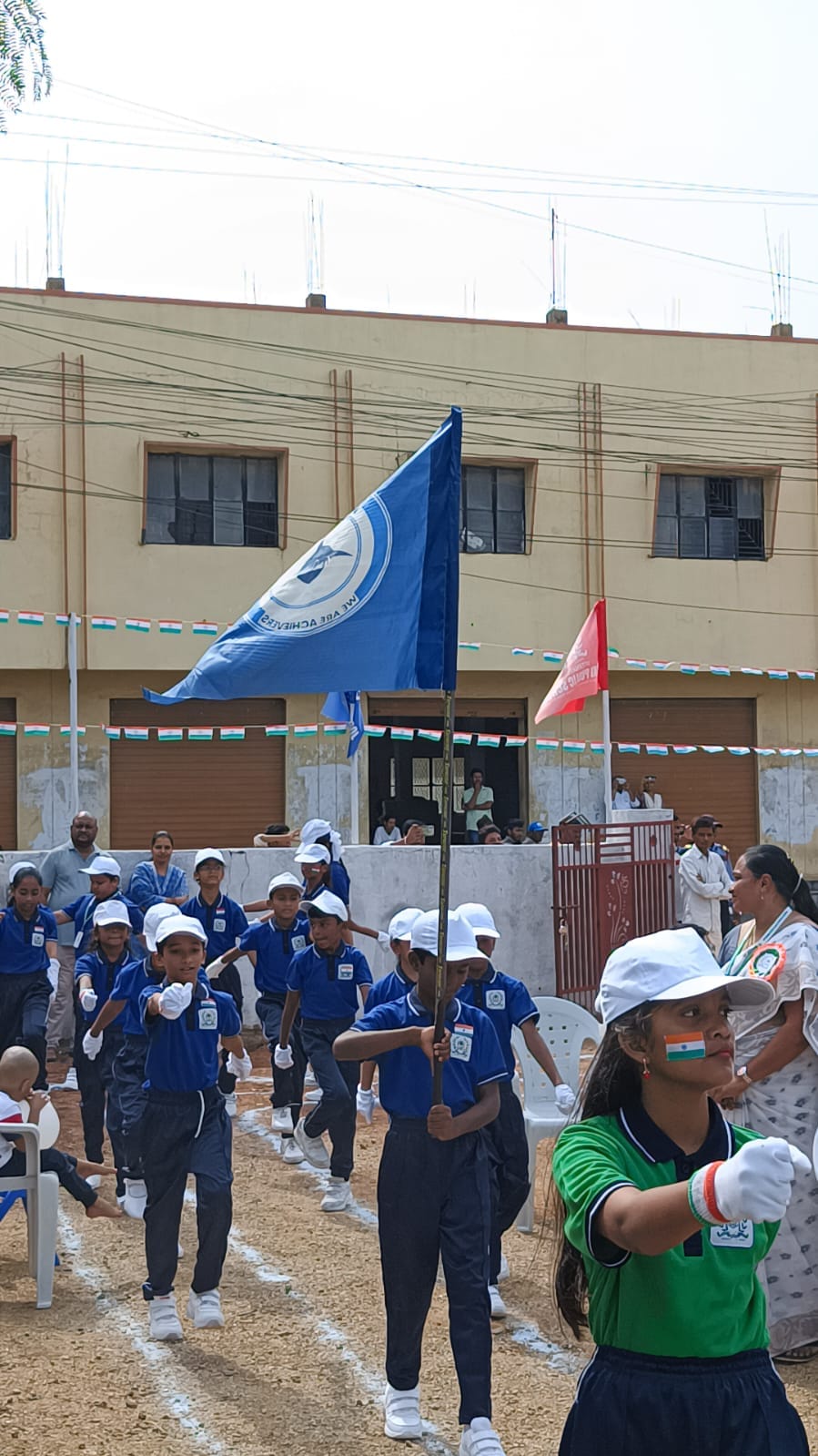 IDPS Vanasthalipuram sports day with school building